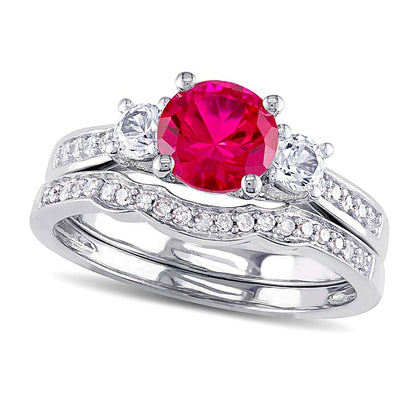 6.0mm Lab-Created Ruby and White Sapphire with 0.13 CT. TW Diamond Three Stone Bridal Set in 10K White Gold