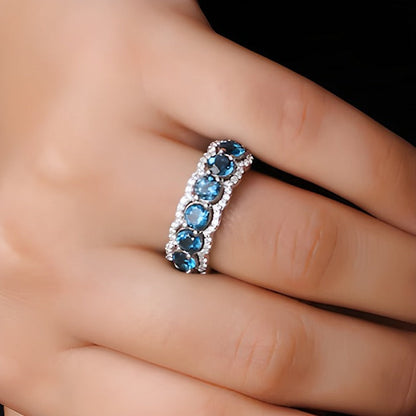 4.0mm London Blue Topaz and White Lab-Created Zircon Scallop Border Seven Stone Ring in Sterling Silver