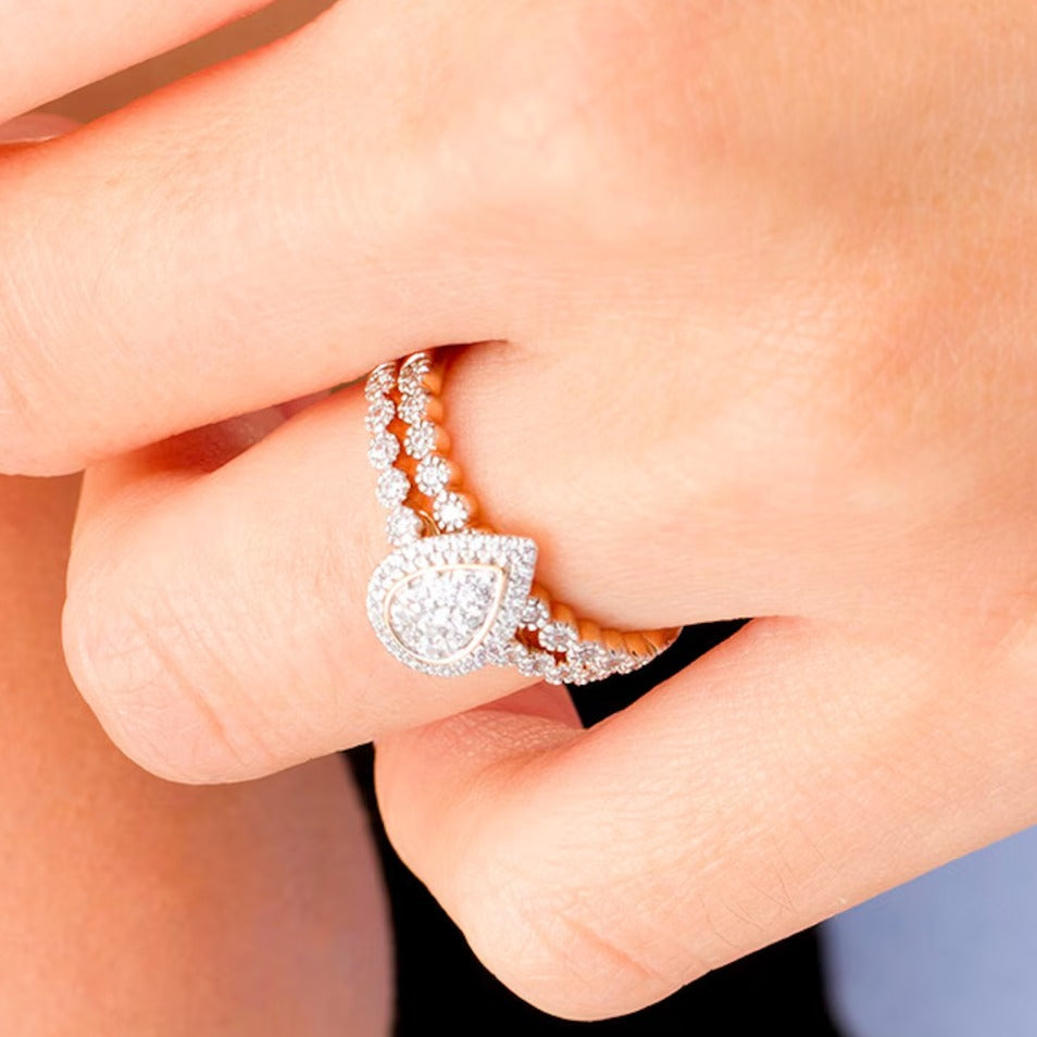 0.33 CT. TW Composite Diamond Pear-Shaped Frame Bridal Set in 10K Rose Gold