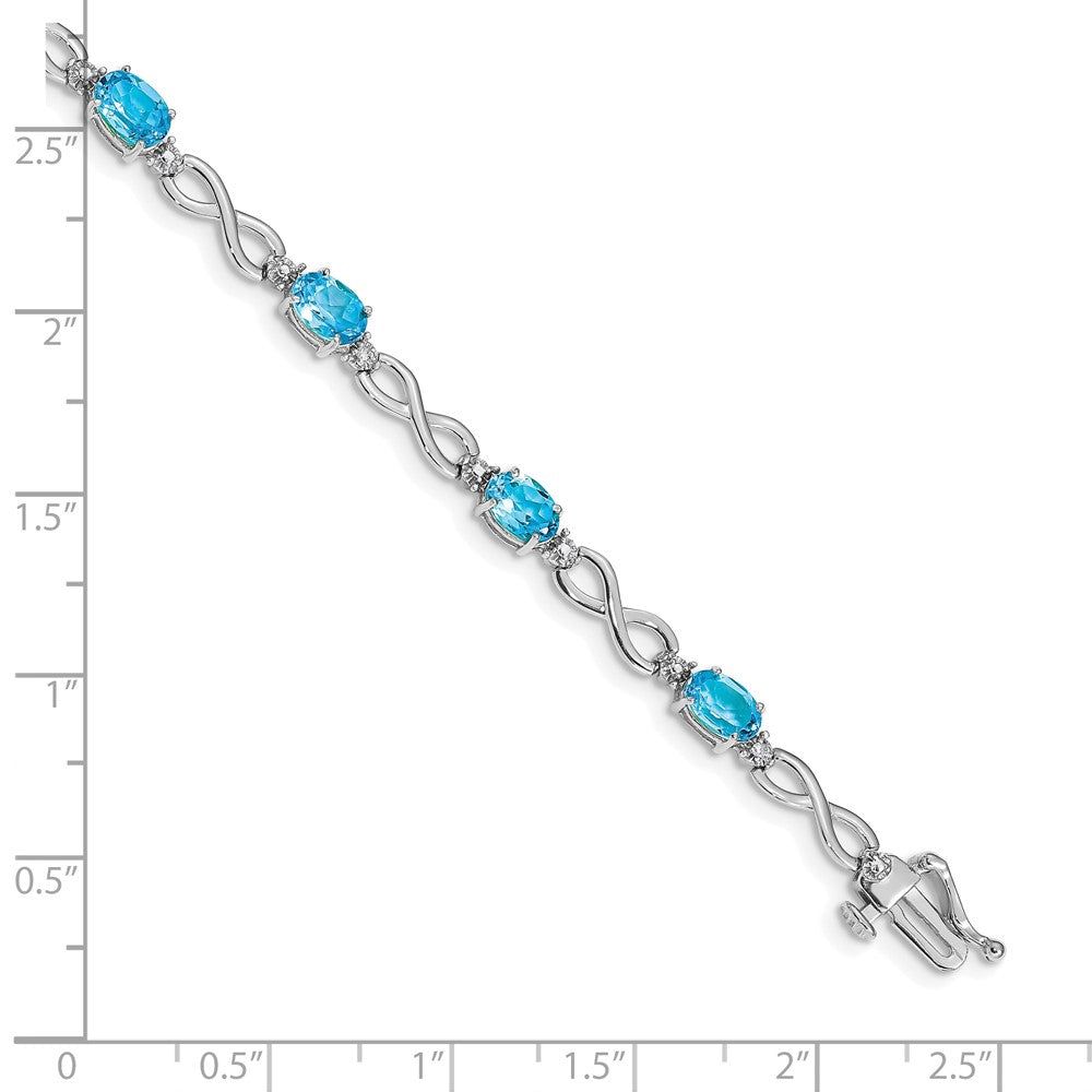 10K White Gold Blue Topaz And Diamond Infinity Bracelet