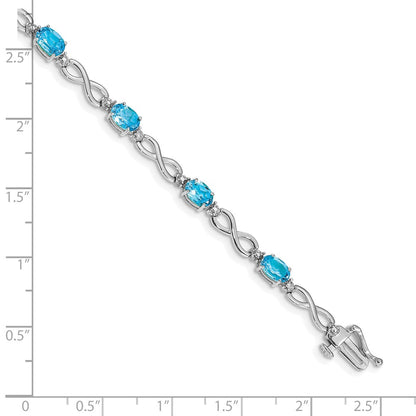 10K White Gold Blue Topaz And Diamond Infinity Bracelet