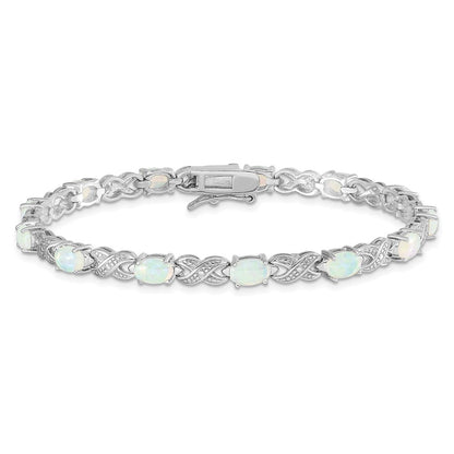 7.5 Inch Sterling Silver Rhodium Plated 7.5Inch Created Opal Xo Bracelet