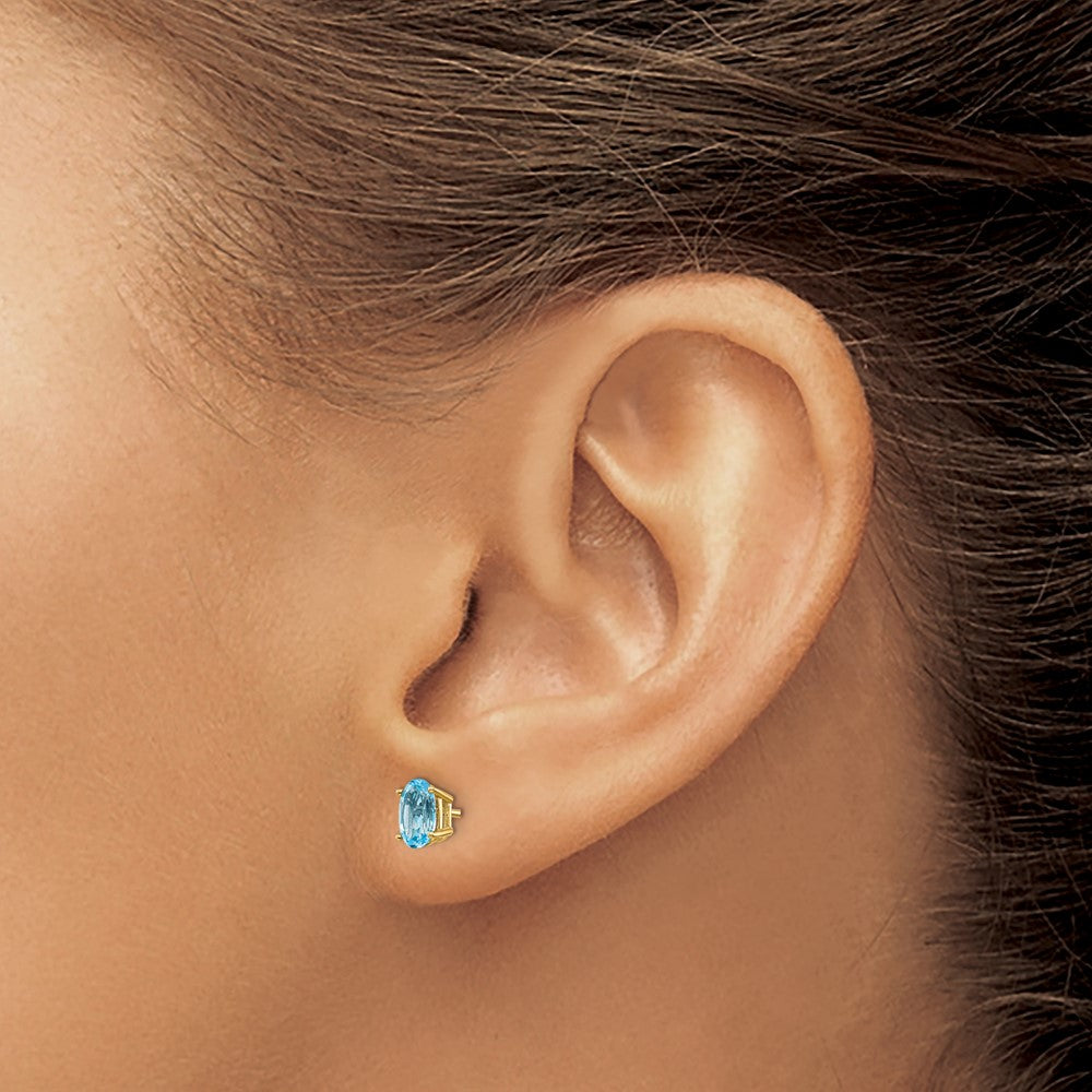 14K Yellow Gold 6X4 Oval December/Blue Topaz Post Earrings