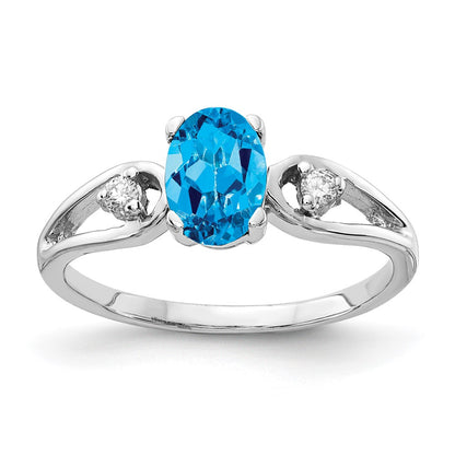 14k White Gold 7x5mm Oval Blue Topaz A Real Diamond ring