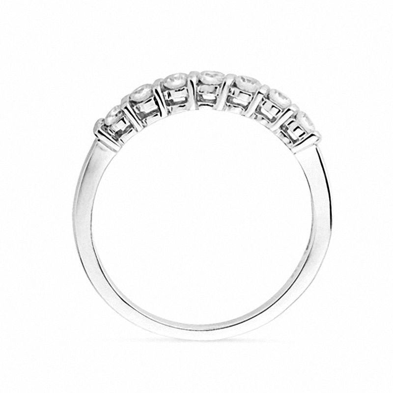 0.20 CT. T.W. Natural Diamond Seven Stone Wedding Band in Solid 10K White Gold