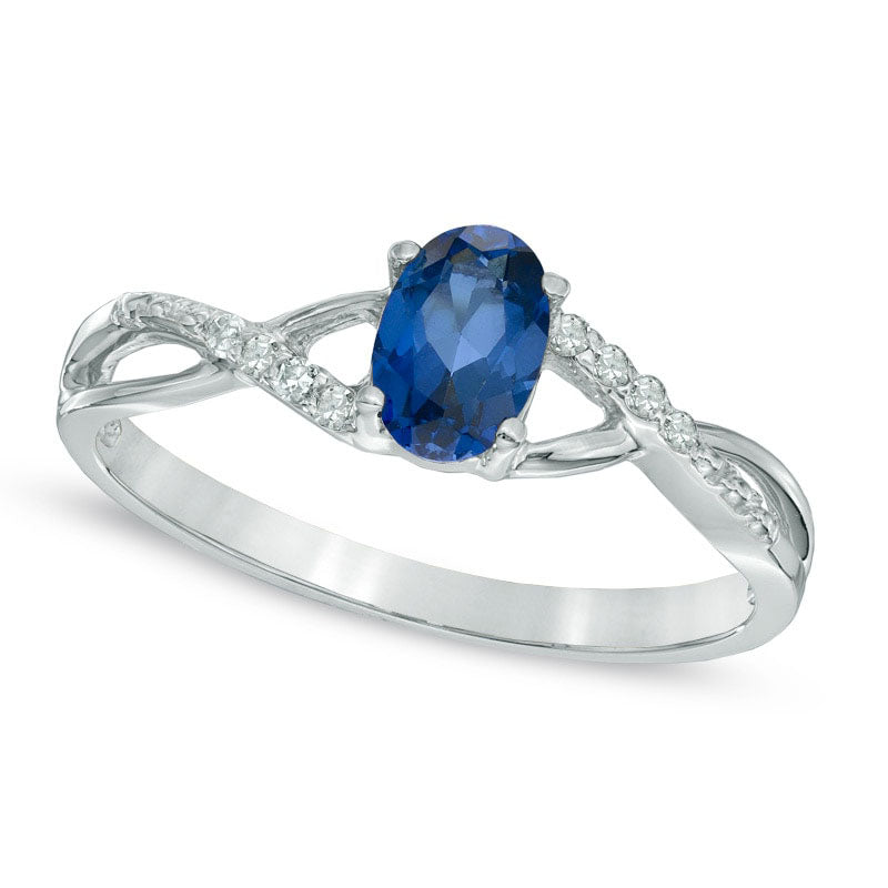 Oval Lab-Created Blue Sapphire and Diamond Accent Twist Engagement Ring in Solid 10K White Gold