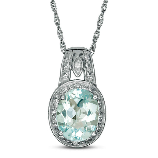 Oval Blue Topaz and Natural Diamond Accent Frame Pendant in Sterling Silver