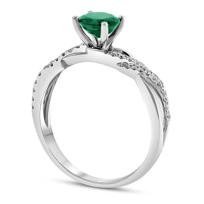 5.5mm Emerald and 0.17 CT. T.W. Natural Diamond Double Row Open Crossover Engagement Ring in Solid 18K White Gold
