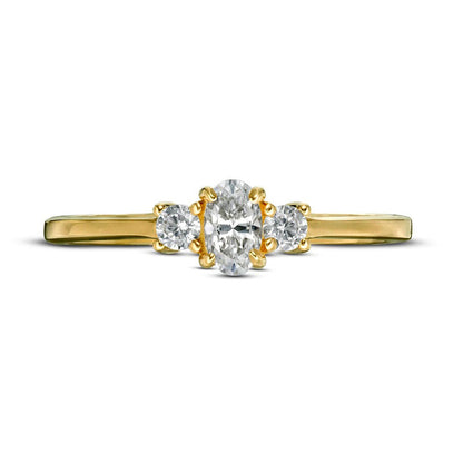 0.50 CT. T.W. Oval and Round Natural Diamond Three Stone Engagement Ring in Solid 14K Gold