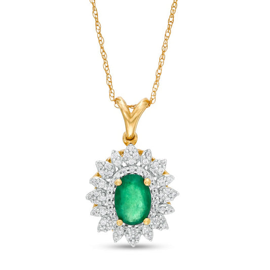 Oval Emerald and 0.2 CT. T.W. Natural Diamond Flower Frame Pendant in 10K Yellow Gold