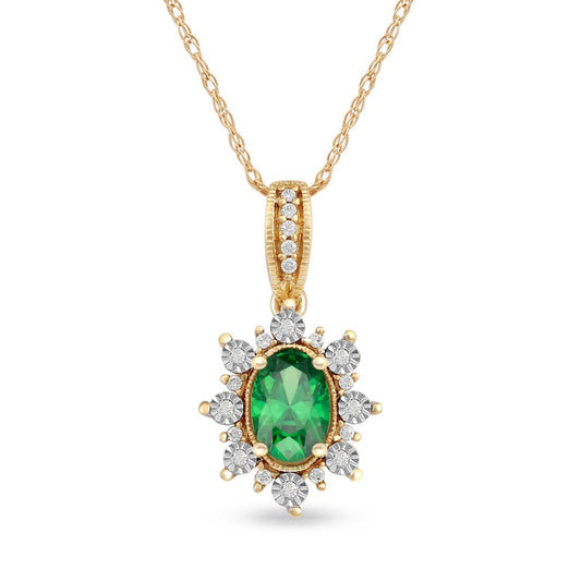 Oval Emerald and 0.07 CT. T.W. Natural Diamond Sunburst Frame Antique Vintage-Style Drop Pendant in 10K Yellow Gold