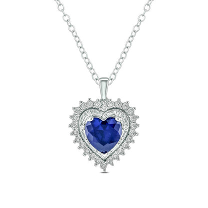8.0mm Lab-Created Blue Sapphire and 0.2 CT. T.W. Diamond Starburst Double Frame Heart Pendant in Sterling Silver