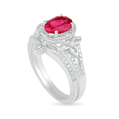 Oval Lab-Created Ruby and 0.07 CT. T.W. Diamond Bead Frame Flower-Sides Split Shank Bridal Engagement Ring Set in Sterling Silver