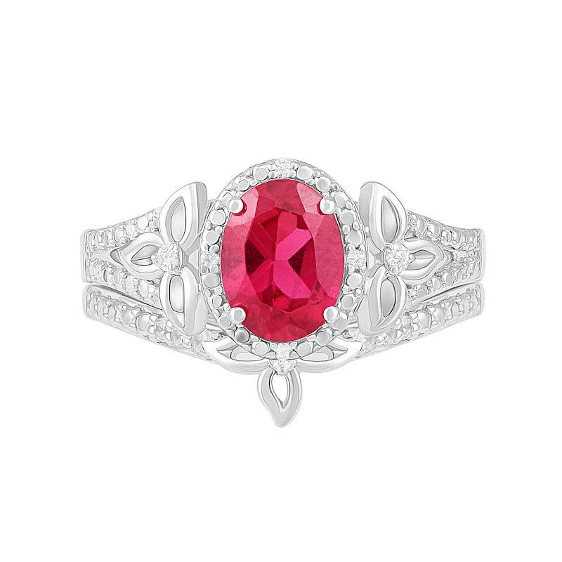Oval Lab-Created Ruby and 0.07 CT. T.W. Diamond Bead Frame Flower-Sides Split Shank Bridal Engagement Ring Set in Sterling Silver