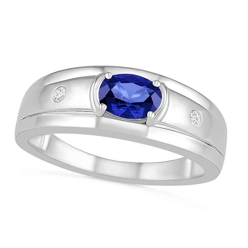 Men's Oval Blue Lab-Created Sapphire and 0.05 CT. T.W. Diamond Duo Stepped Edge Ring in Sterling Silver
