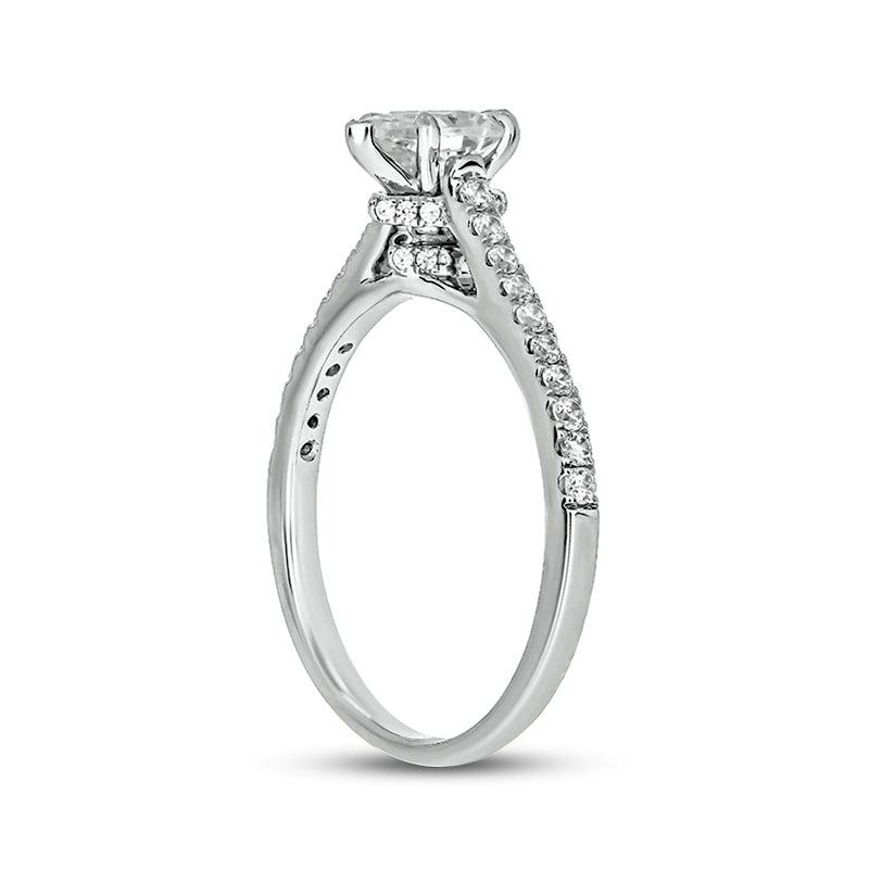 0.75 CT. T.W. Pear-Shaped Natural Diamond Engagement Ring in Solid 14K White Gold (I/I2)