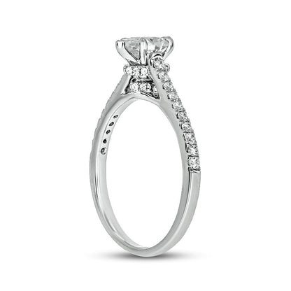 0.75 CT. T.W. Pear-Shaped Natural Diamond Engagement Ring in Solid 14K White Gold (I/I2)