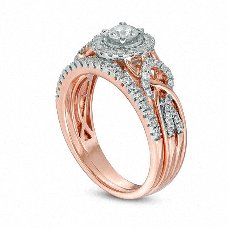 Previously Owned - 0.75 CT. T.W. Natural Diamond Frame Braided Infinity Bridal Engagement Ring Set in Solid 14K Two-Tone Gold