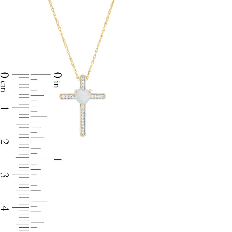 5.0mm Heart-Shaped Lab-Created Opal and 0.05 CT. T.W. Diamond Antique Vintage-Style Cross Pendant in 10K Yellow Gold