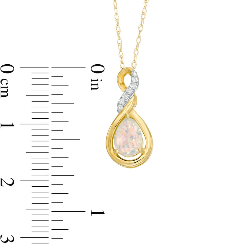 Pear-Shaped Lab-Created Opal and Diamond Accent Cascading Teardrop Pendant in 10K Yellow Gold