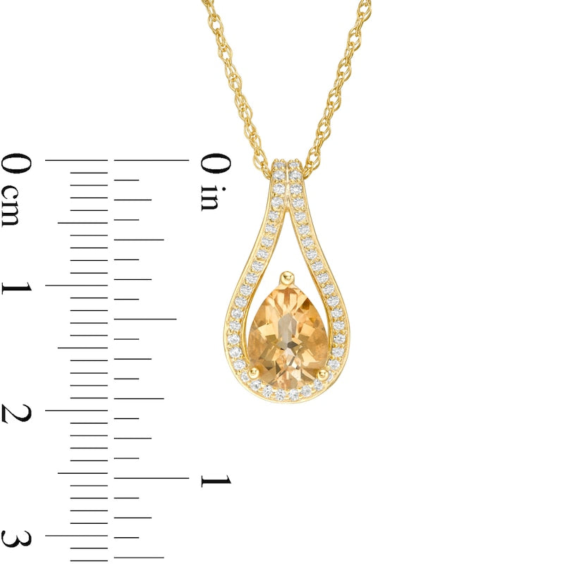 Pear-Shaped Citrine and 0.13 CT. T.W. Natural Diamond Teardrop Pendant in 10K Yellow Gold