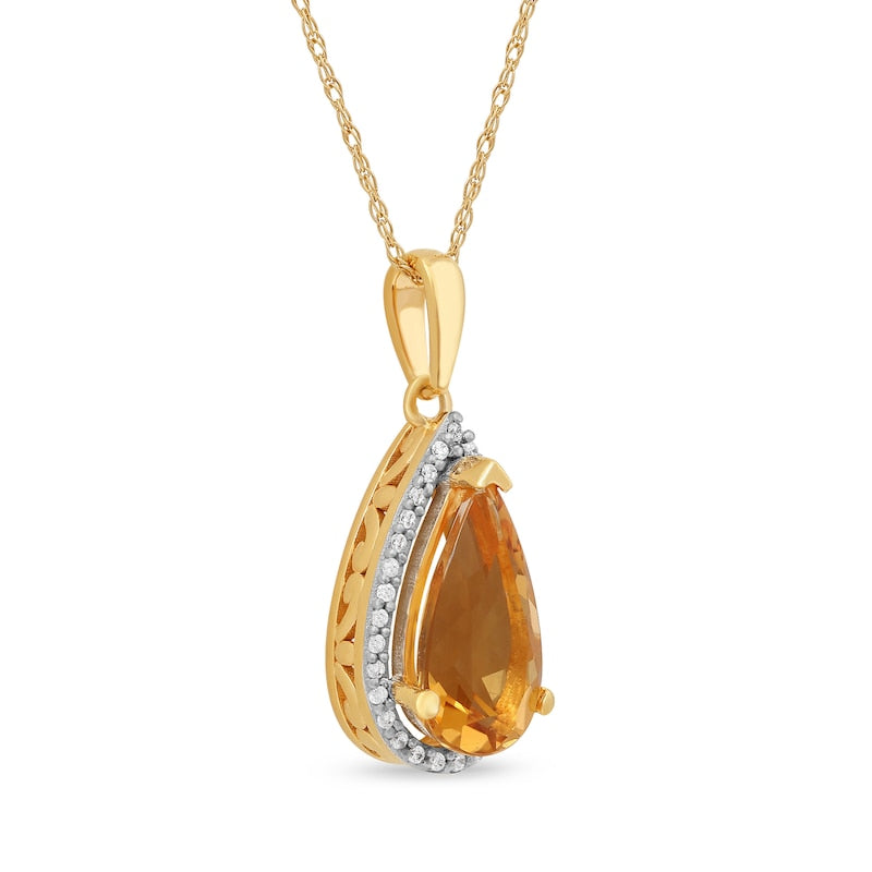 Pear-Shaped Citrine and 0.1 CT. T.W. Natural Diamond Frame Pendant in 10K Yellow Gold