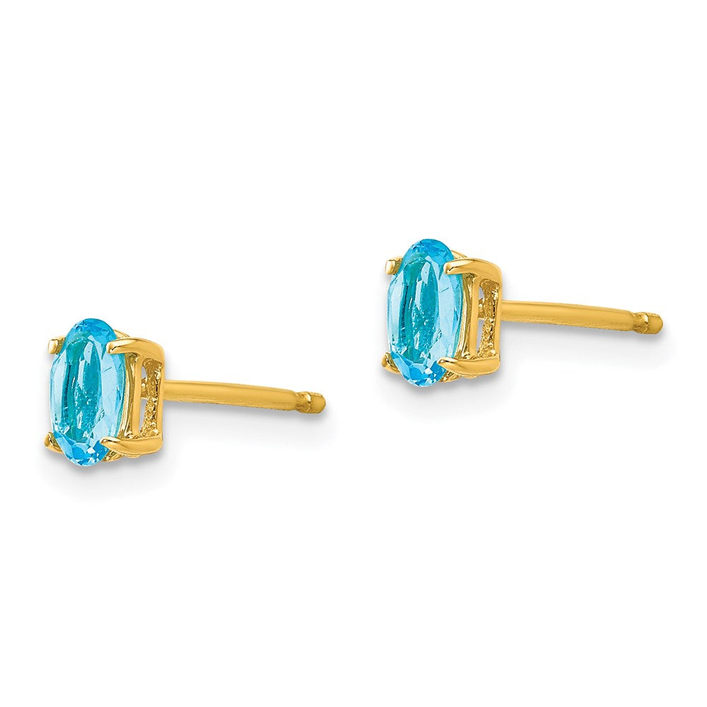 14k Yellow Gold 5x3mm Oval Blue Topaz Earrings