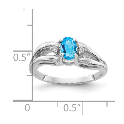 14k White Gold 6x4mm Oval Blue Topaz A Real Diamond ring