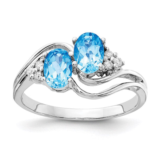 14k White Gold 6x4mm Oval Blue Topaz A Real Diamond ring