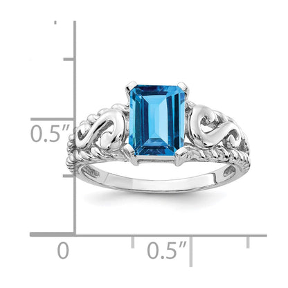 14k White Gold 8x6mm Emerald Cut Blue Topaz ring