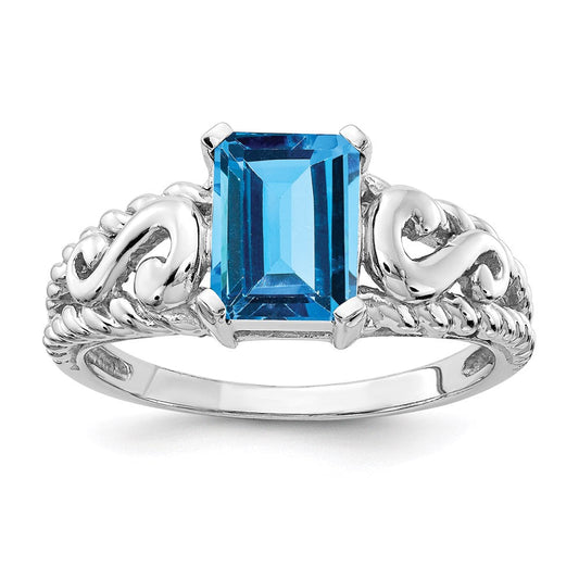 14k White Gold 8x6mm Emerald Cut Blue Topaz ring
