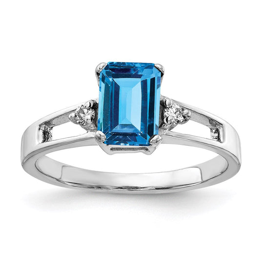 14k White Gold 7x5mm Emerald Cut Blue Topaz A Real Diamond ring
